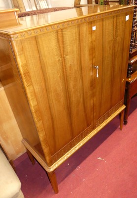 Lot 1365 - A Scandinavian walnut double door side...