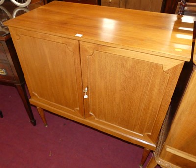 Lot 1370 - A 1970s teak double door cutlery cupboard, the...