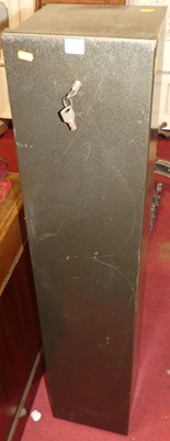 Lot 1381 - A steel single door gun cabinet with two keys,...