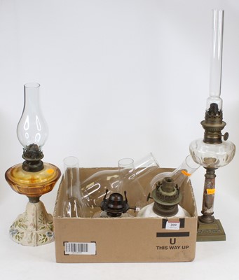 Lot 209 - A Victorian oil lamp having an Eveready & Co...