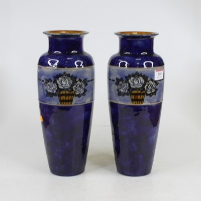 Lot 210 - A pair of Royal Doulton stoneware vases of...