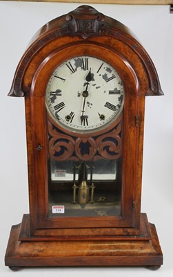 Lot 219 - A late Victorian walnut cased dome top mantel...