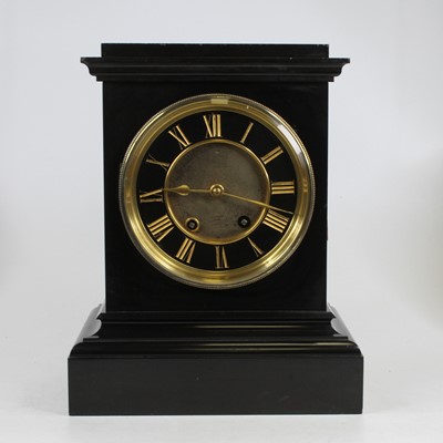 Lot 220 - A Victorian black slate cased mantel clock,...