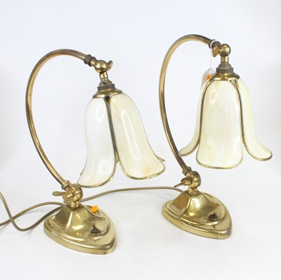 Lot 243 - A pair of Arts & Crafts style adjustable brass...