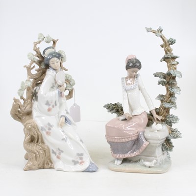 Lot 244 - A Lladro porcelain figure of a geisha modelled...