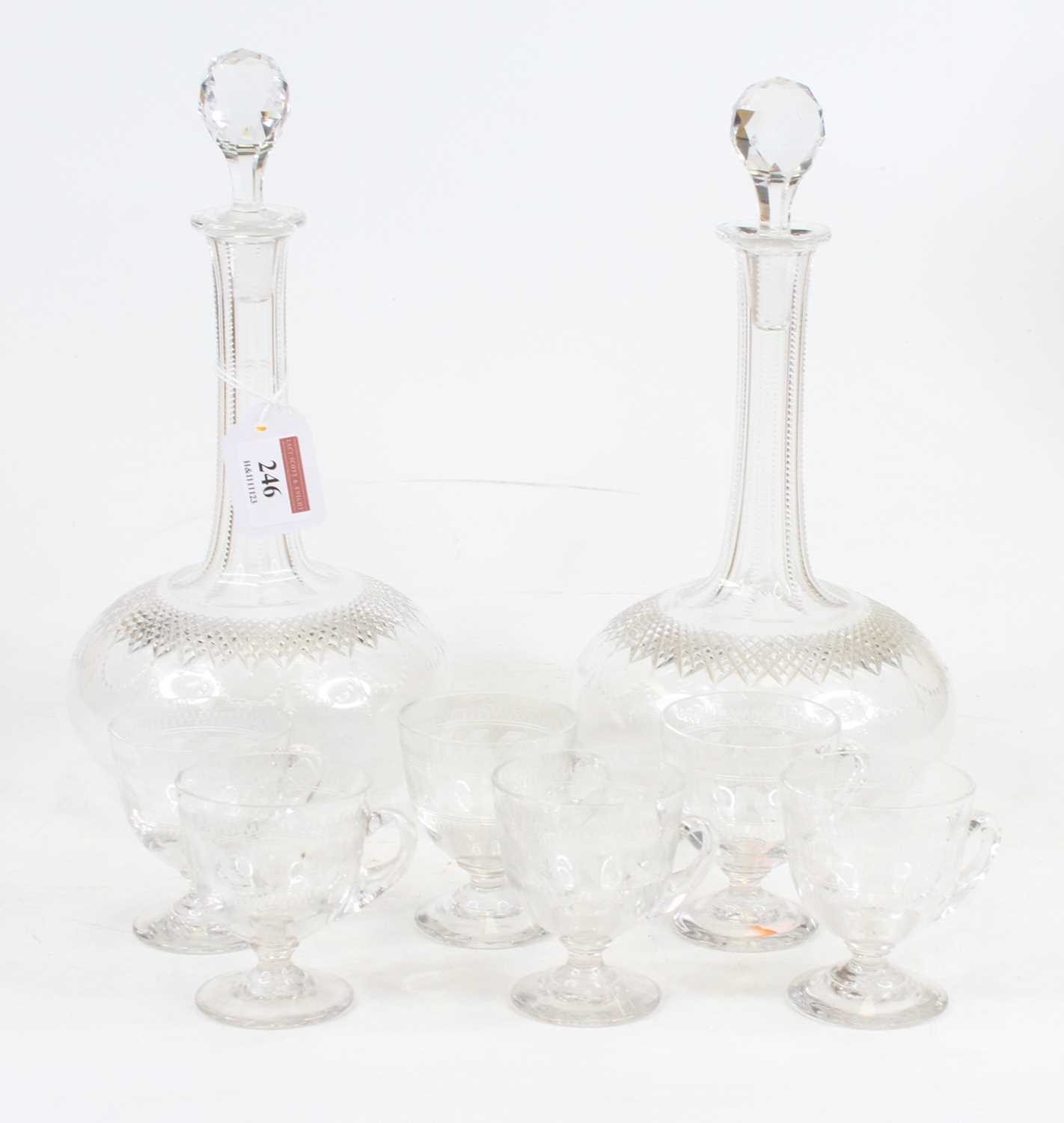 Lot 246 - A pair of Edwardian cut glass decanters and...