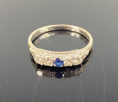 Lot 379 - A white metal sapphire and diamond five stone...