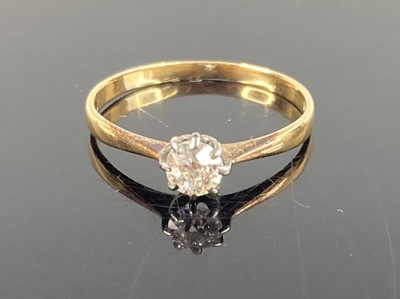 Lot 382 - An 18ct gold diamond solitaire ring, the eight...