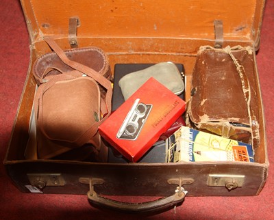 Lot 685 - A leather case and contents to include pocket...