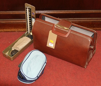 Lot 692 - A leather doctor's bag and contents to include...