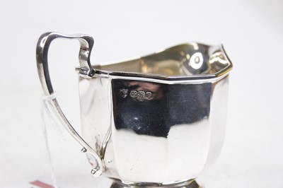 Lot 308 - A George V silver milk jug, of decagonal form,...