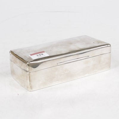 Lot 329 - A George V silver clad table cigarette box, of...