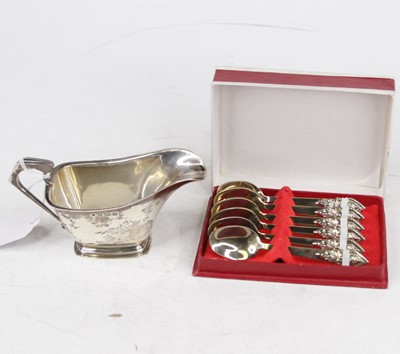 Lot 339 - An Art Deco silver sauceboat, having a folded...