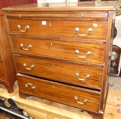 Lot 1402 - An early 19th century mahogany chest of four...