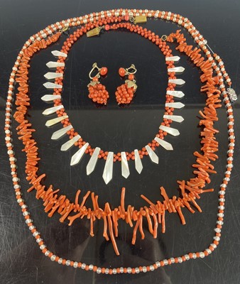 Lot 407 - A natural coral strand necklace together with...