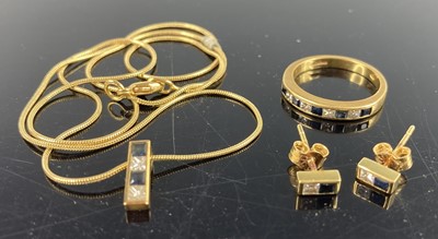 Lot 432 - A contemporary 18ct gold sapphire and diamond...