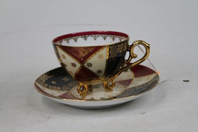 Lot 580 - A Vienna porcelain teacup and saucer, the cup...