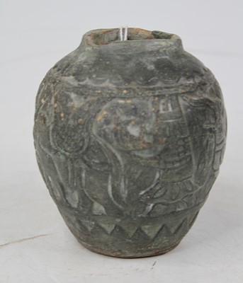 Lot 576 - A moulded stoneware vase, of ovoid shape,...