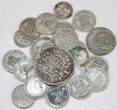 Lot 462 - A selection of British silver coins to include...