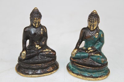 Lot 453 - A near pair of miniature gilt brass figures of...