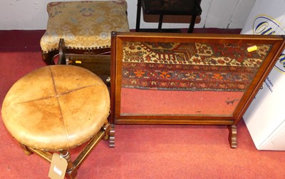 Lot 1075 - A beech wood and leather topped stool; 19th...