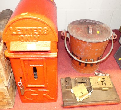 Lot 1078 - A George V period cast iron and later red...