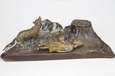 Lot 515 - A brass figural inkwell, modelled as a young...