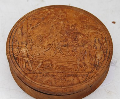 Lot 542 - A Spanish 19th century carved circular pressed...