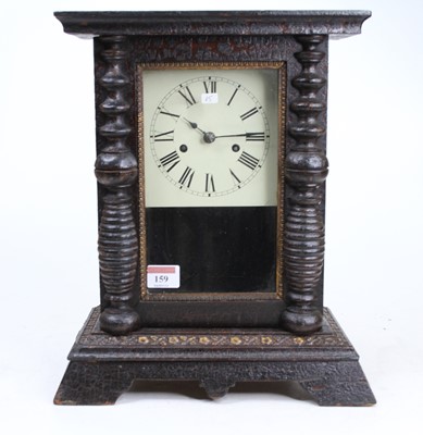 Lot 159 - A mid 19th century Black Forest mantel clock...