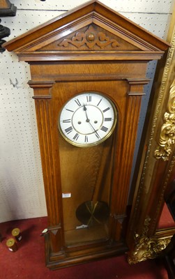 Lot 1193 - A late 19th century oak cased Vienna wall...