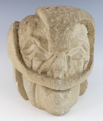 Lot 657 - A mid-20th century abstract carved stone head...