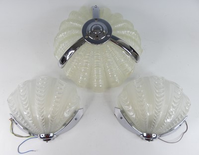 Lot 623 - A pair of Art Deco chromed metal and moulded...