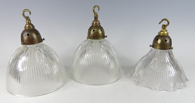 Lot 625 - A pair of Holophane glass ceiling lights, each...