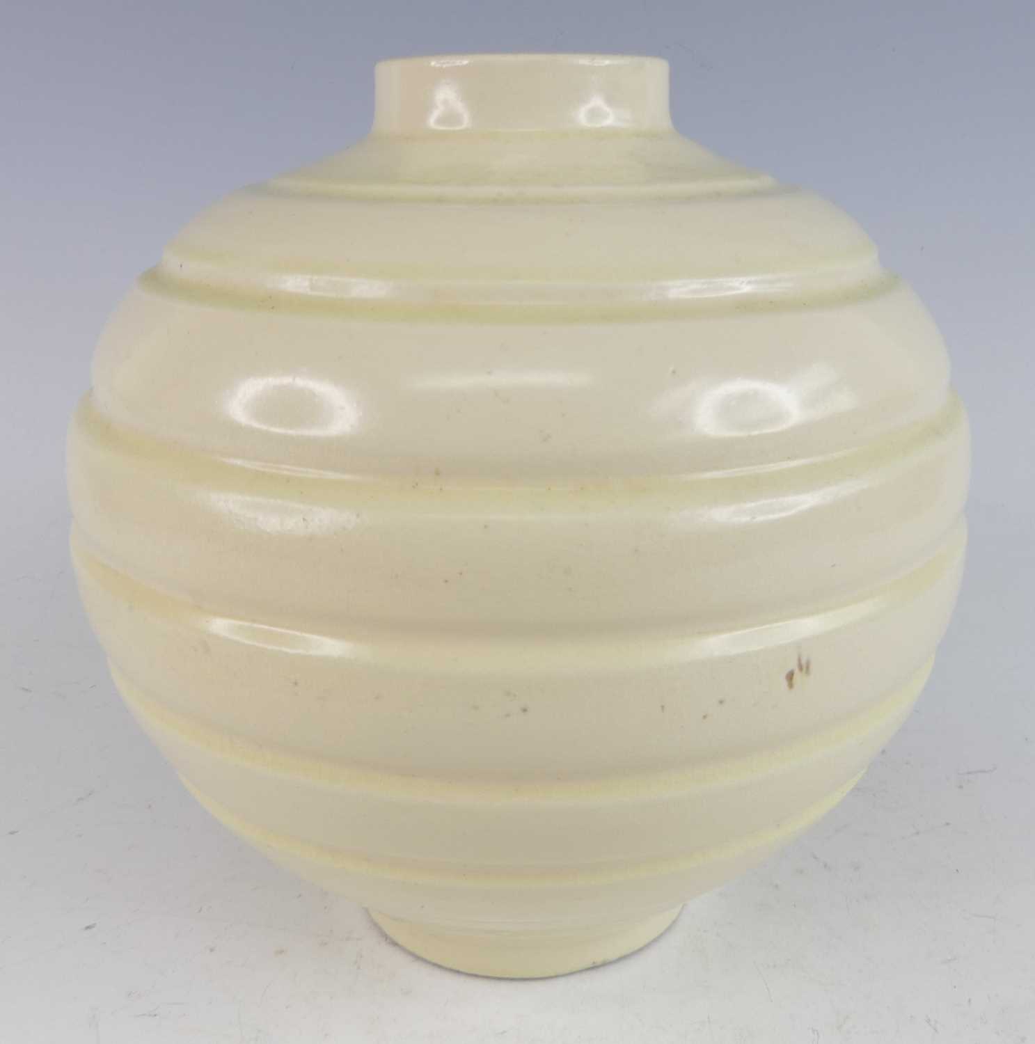Lot 514 - An early 20th century pottery vase by C.H....