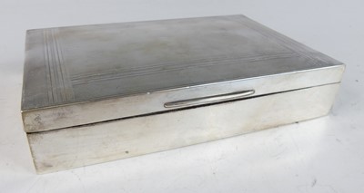 Lot 561 - A late Art Deco silver table cigarette box,...
