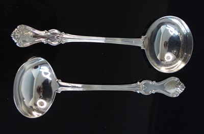 Lot 2102 - A pair of Victorian silver soup ladles, in the...