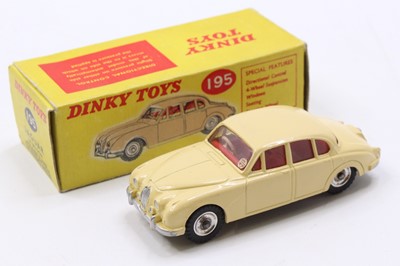 Lot 1108 - A Dinky Toys No. 195 Jaguar 3.4 saloon...