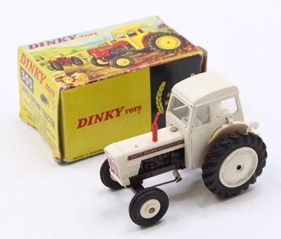 Lot 1052 - A Dinky Toys No. 305 David Brown tractor...