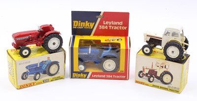 Lot 1166 - A collection of three various boxed Dinky Toy...