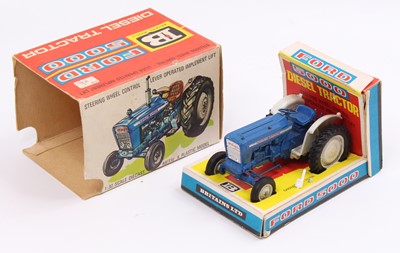 Lot 713 - A Britains No/. 9527 Ford 5000 diesel tractor,...