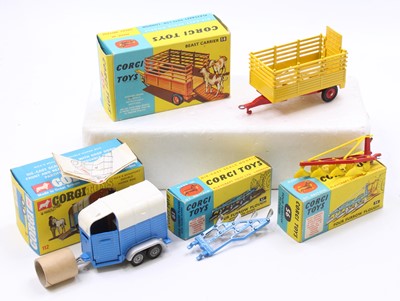 Lot 1283 - A collection of four various boxed Corgi Toy...