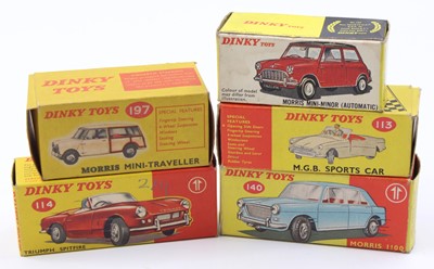 Lot 1186 - A collection of five empty Dinky Toy card...