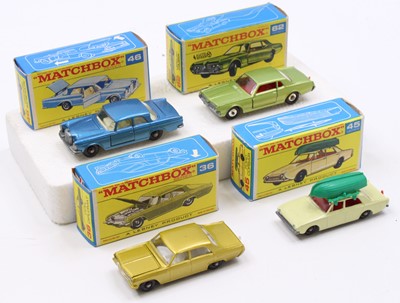 Lot 1374 - A collection of four boxed Matchbox type E...