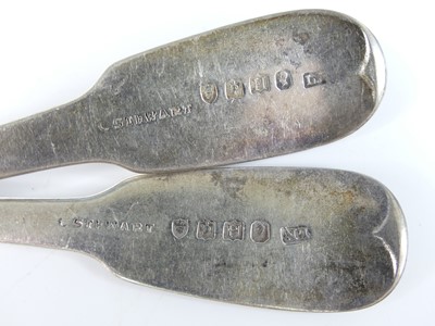 Lot 2076 - Two George IV Irish silver dessert spoons, in...