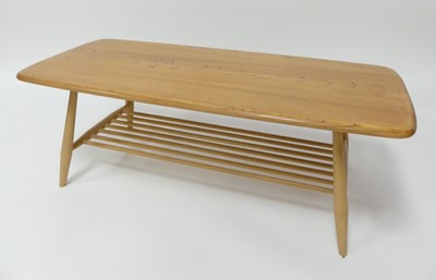 Lot 795 - An Ercol light elm Windsor 459 low coffee...