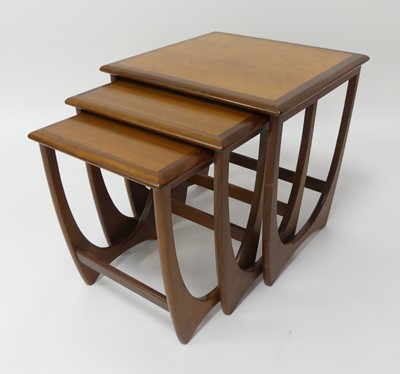 Lot 779 - An 1960s G-Plan 'Fresco' teak nest of three...