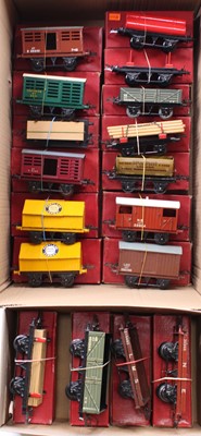 Lot 293 - Seventeen Hornby 4-wheel post-war goods wagons,...