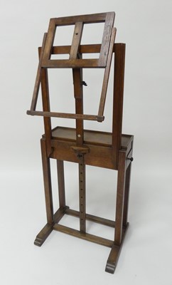 Lot 761 - An Arts & Crafts oak freestanding artists...