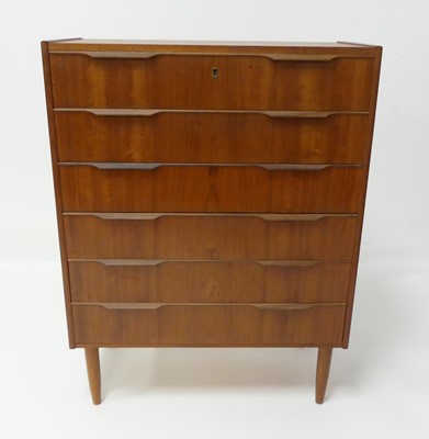 Lot 811 - A 1960s Danish teak chest of six long...