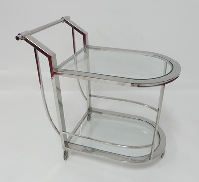 Lot 836 - A contemporary chrome and glass inset two-tier...